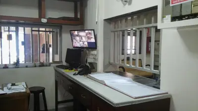 a room with a desk with a computer on it at Hotel Estación Central in Lima