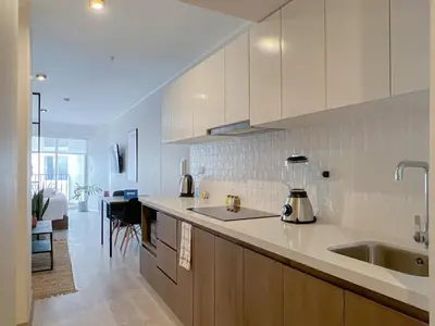a kitchen with a sink and a counter top at Studio 4 by Geko in Lima