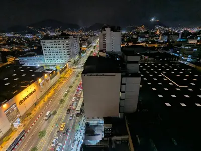 a view of a city at night with traffic at Amplia habitación en centro de Lima in Lima