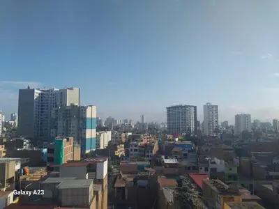 a view of a city with tall buildings at Moderno departamento con vista panorámica cerca a los centros comerciales in Lima