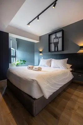 a bedroom with a large white bed in a room at Miraflores Modern Apartments Benavides by Geko in Lima