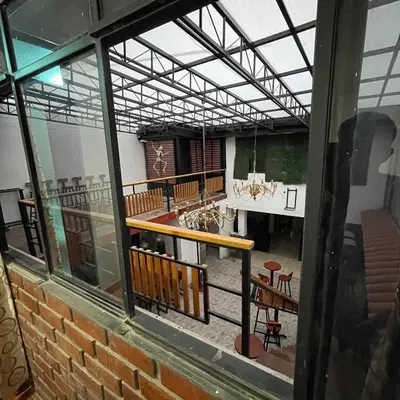 a view of a building from a window at Casa La warida con tres niveles in Ayacucho