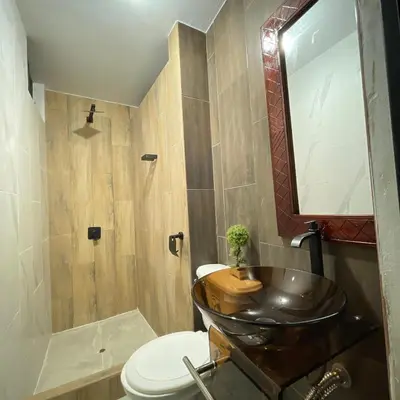 a bathroom with a sink and a toilet at Casa La warida con tres niveles in Ayacucho