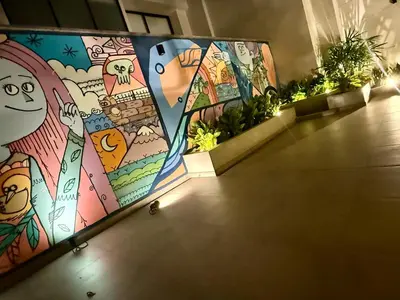 a hallway with a mural on the wall at Rest, comfort and privacy in San Isidro in Lima