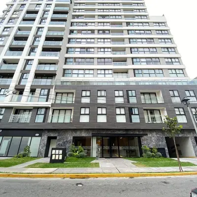 an apartment building with a large building at Departamento de estreno en San Isidro in Lima
