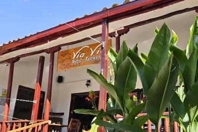 a building with a sign that says yo vietnamese restaurant at ViaVia Ayacucho in Ayacucho