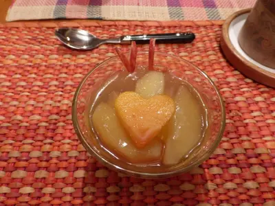 a glass bowl of food with a heart in it at Andean Spirit Lodge in Mollepata