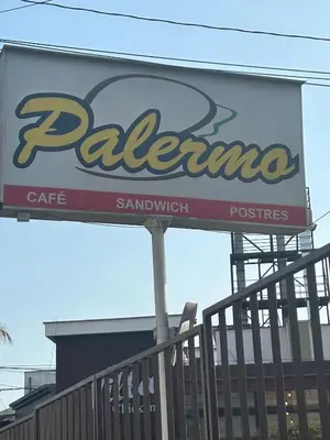 a sign for a palermo cafe on a building at Apartment - US Embassy in Lima