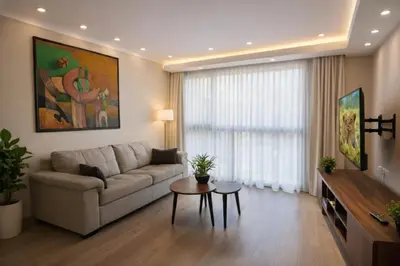 a living room with a couch and a table at Relajar y trabajar en Miraflores in Lima