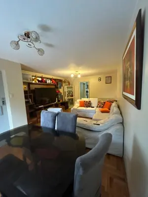 a living room with two beds and a couch at Comfort and family exclusivity in Lima