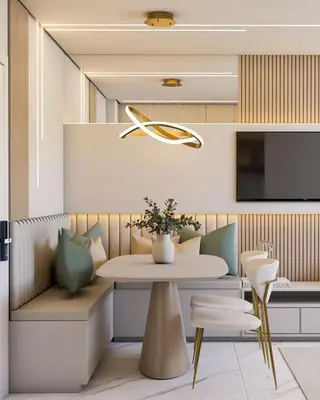 a dining room with a table and chairs and a tv at Leyendas 2090 in Lima