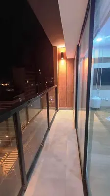 a view of a balcony of a building at night at Apartment in Miraflores - Lima in Lima