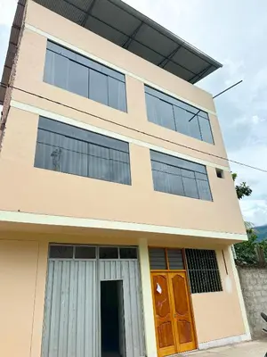 a large building with a lot of windows at Departamento Maranura Quillabamba in Maranura