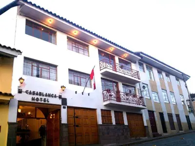 a large white building with a lot of windows at Hotel WhiteHouse in Cusco
