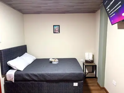 a bedroom with a bed in a room at Casa Cusco in Cusco