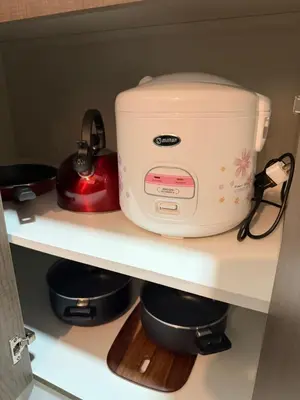 a toaster sitting on a shelf in a kitchen at Art08 Milu - Miraflores Cerca de Larcomar in Lima