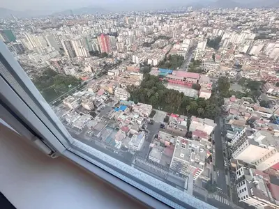 an aerial view of a city from a window at departamento nuevo con espectacular vista entre surco y Miraflores in Lima