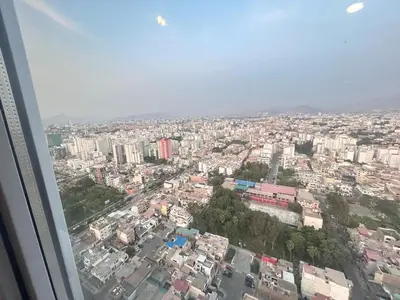 an aerial view of a city from an airplane at departamento nuevo con espectacular vista entre surco y Miraflores in Lima