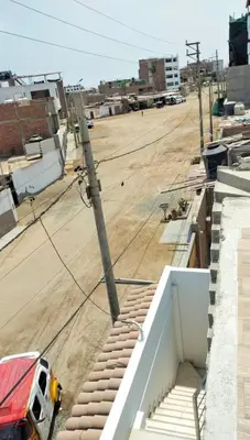 a view of an empty parking lot with a truck at Luxurious Apt with Rooftop, BBQ, and Beach nearby in Punta Hermosa