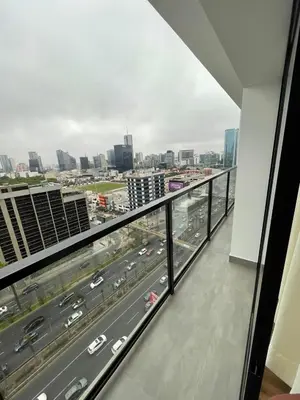 a view of a highway from a balcony of a building at Depa en Av Javier Prado frente a San isi in Lima