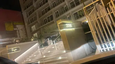 a building with a bunch of stairs in front of it at VIP Apartment TORRE TEMPO in Lima