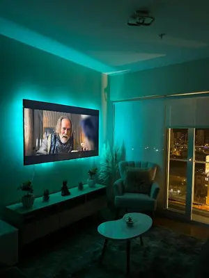 a living room with a flat screen tv on a wall at VIP Apartment TORRE TEMPO in Lima