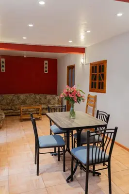 a dining room with a table and chairs at CHARMING AND QUIET apart IN CUSCO in Cusco