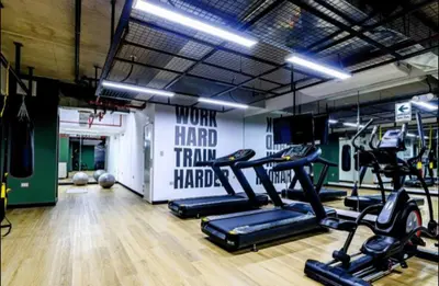 a gym with several tread machines in a room at Premium Miraflores Stay with Pool and Amenities in Lima