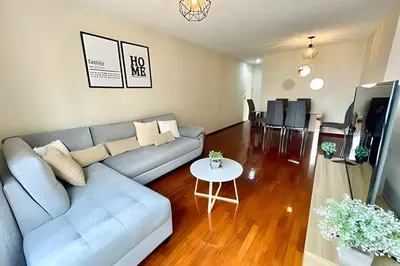 a living room with a couch and a table at Cosy place retreat Miraflores 3BR in Lima