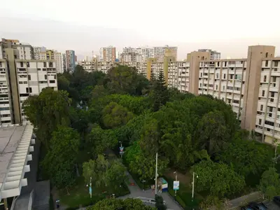 an aerial view of a city with tall buildings at Elegant and spacious penthouse in Lima