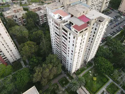 an overhead view of a tall building in a city at Elegant and spacious penthouse in Lima