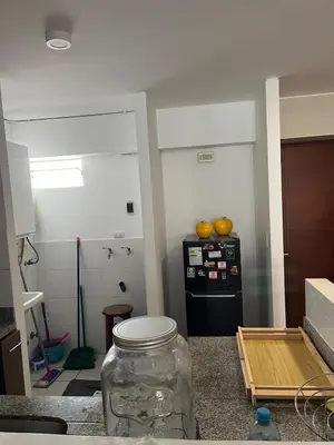 a kitchen with a mason jar on the counter at Emilia House in Lima