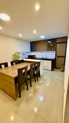 a large dining room with a table and chairs at Departamento completo en el primer piso in Ayacucho