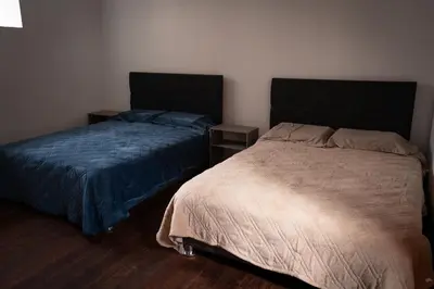a bedroom with two beds in a room at Mini apartment in downtown Cusco in Cusco