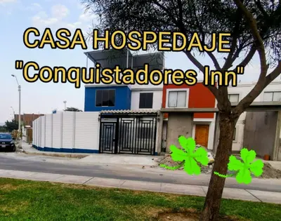 a house with the words casa hosapoleole constrictorones at CASA HOSPEDAJE Conquistadores Inn
