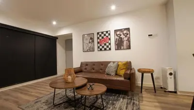 a living room with a couch and two tables at e-t*| Apartamento vista espectacular in Lima