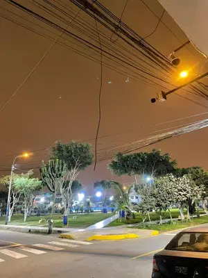 a view of a city street at night at Habitación a 15 min del Aeropuerto in Lima