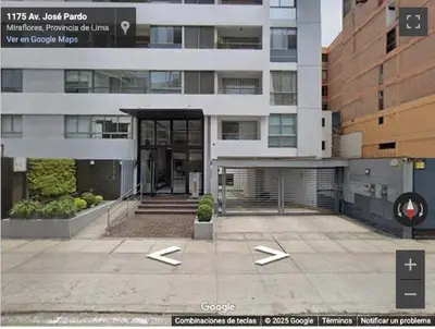 a large white building with a entrance to it at Departamento en Miraflores - Av Pardo Jose in Lima