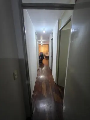 a hallway leading to a room with a hallwayngthngthngthngthngthngthngth at RODRICH apartment 2 in Lima
