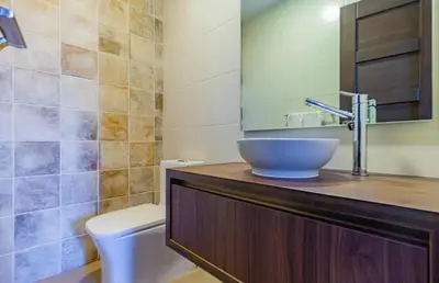 a bathroom with a sink and a toilet at La Panaca Del Inka Apartment in Cusco