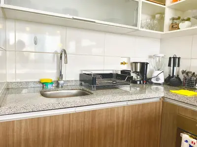 a kitchen with a sink and a counter top at Apartamento exclusivo a un paso de San Isidro in Lima