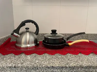 a tea kettle sitting on a counter top at Ocean Blue, Vista Frontal Al Mar in Lima