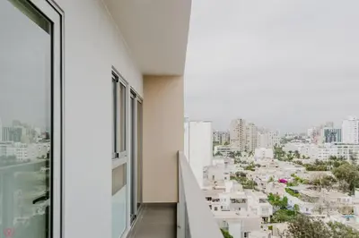 a balcony with a view of a city at Polished 2BR with Balcony in San Isidro in Lima