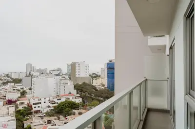 a balcony with a view of a city at Polished 2BR with Balcony in San Isidro in Lima