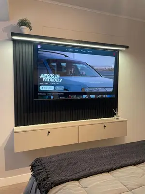 a flat screen tv with a car on it at Art10 Milu - Miraflores-Larcomar in Lima
