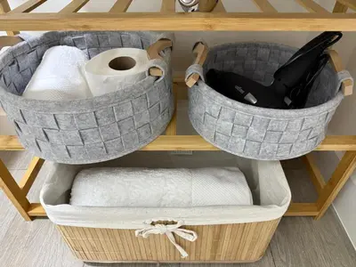 a basket filled with toilet paper and toilet paper rolls at Art10 Milu - Miraflores-Larcomar in Lima