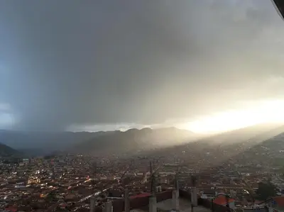 a view of a city with mountains in the background at Mirador Ernesto Gunter in Cusco