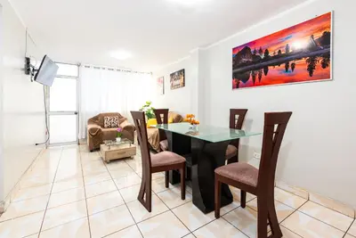 a dining room with a table and chairs at Alameda Suite Ayacucho in Ayacucho