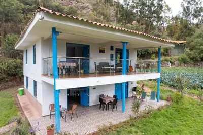 an aerial view of a house with a balcony at Country house in nature in Sacred Valley in Huayllabamba