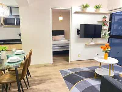 a living room with a table and a dining room at Era 24 mala puntuacion in Lima